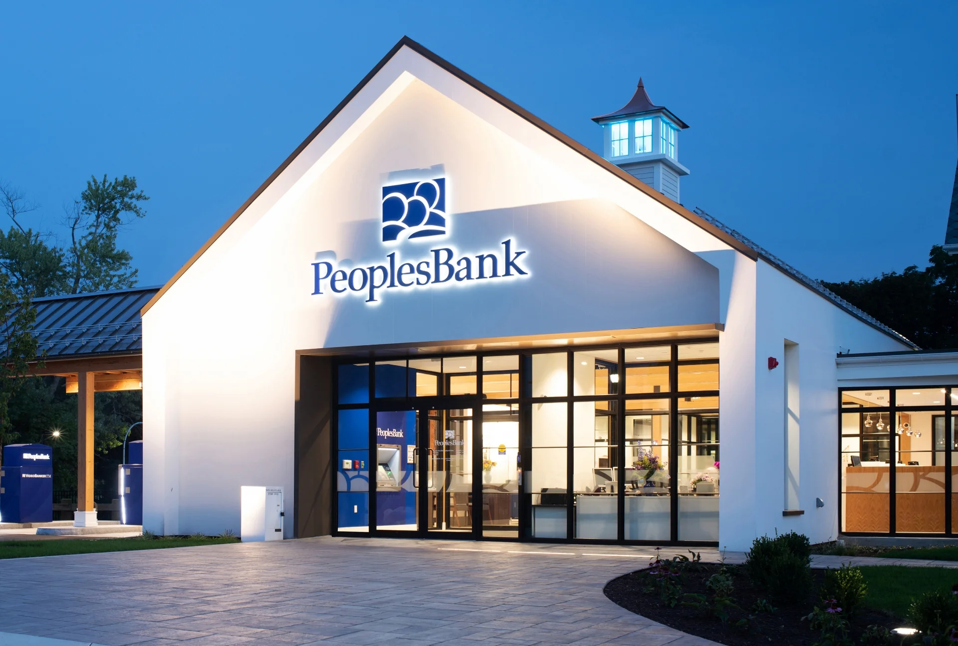 PeoplesBank building exterior with illuminated sign