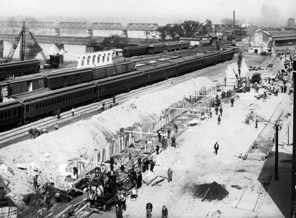 train track and crews making repairs to the Holyoke dam, 1885