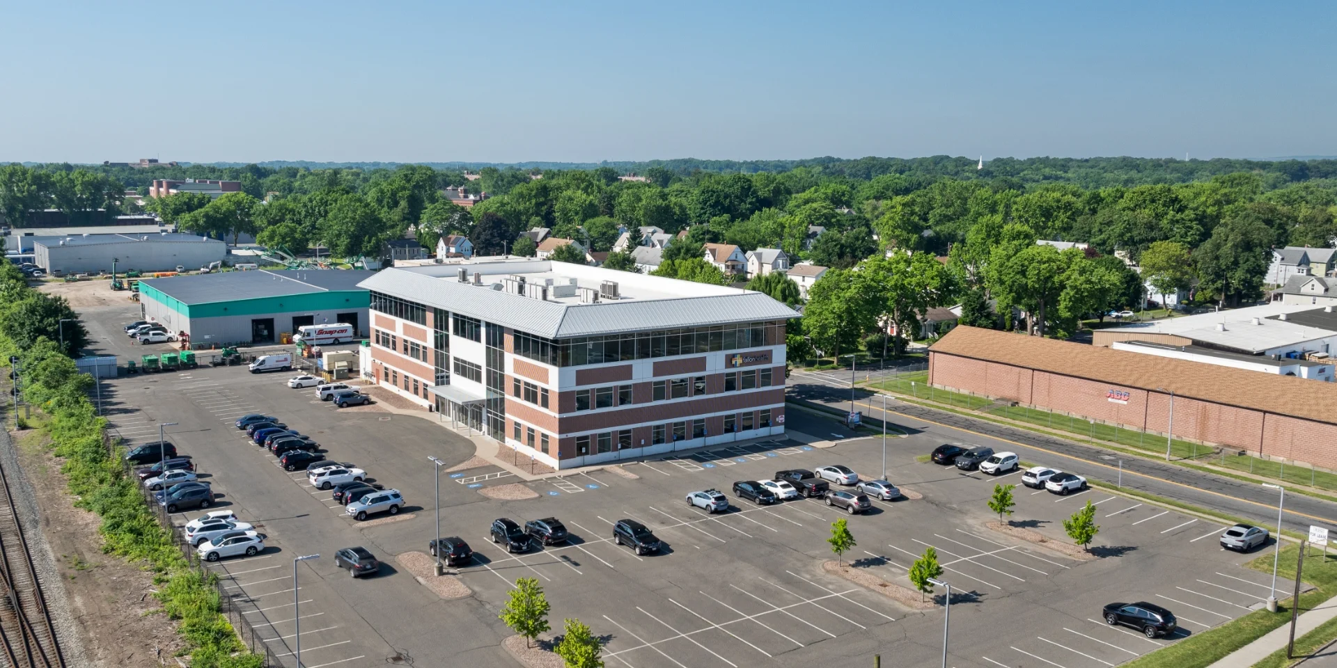 aerial view of building and parking lot