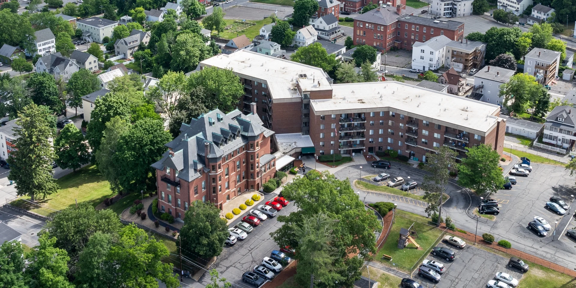 aerial view of property and building roofs