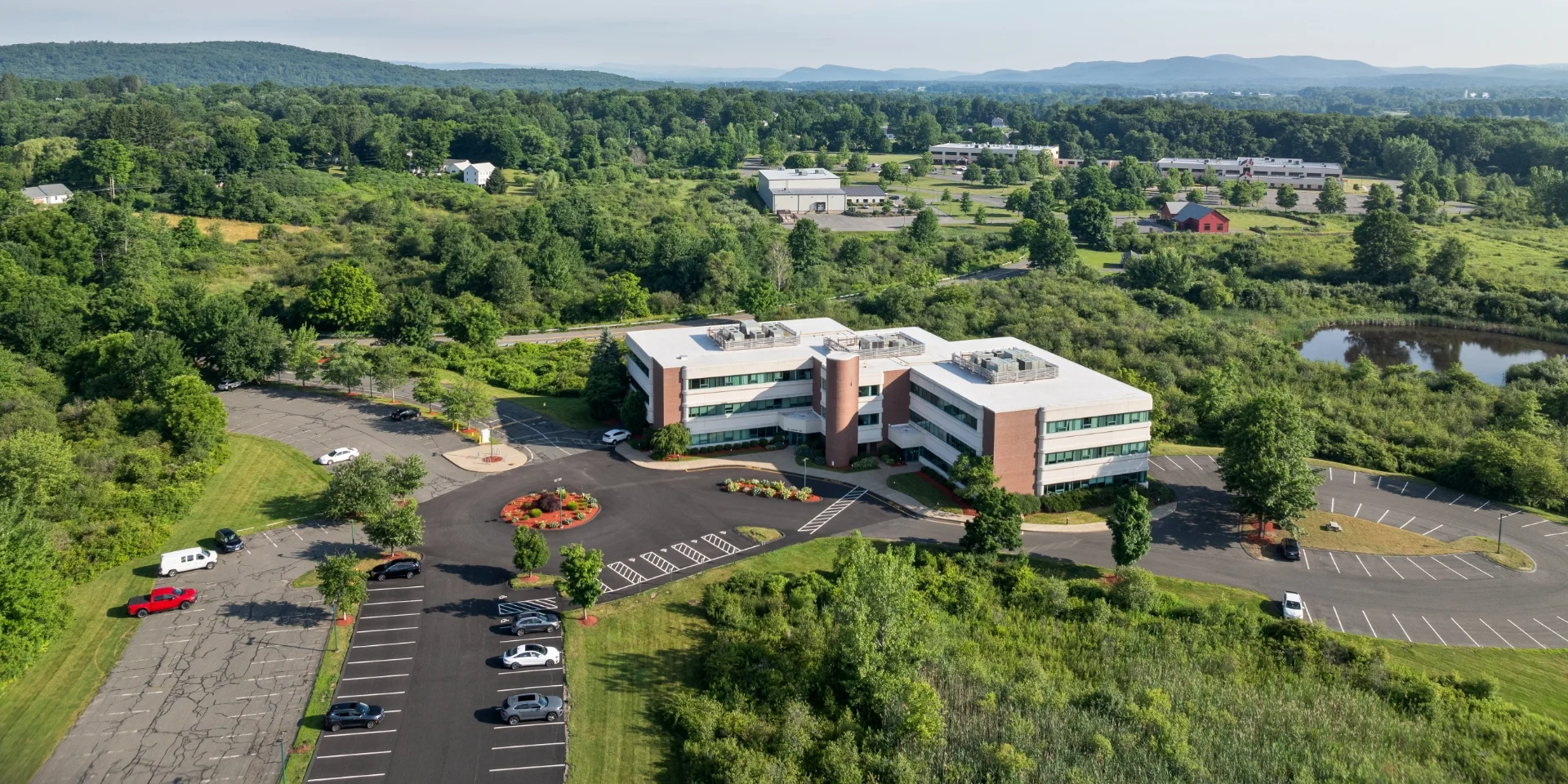 aerial of building exterior and property