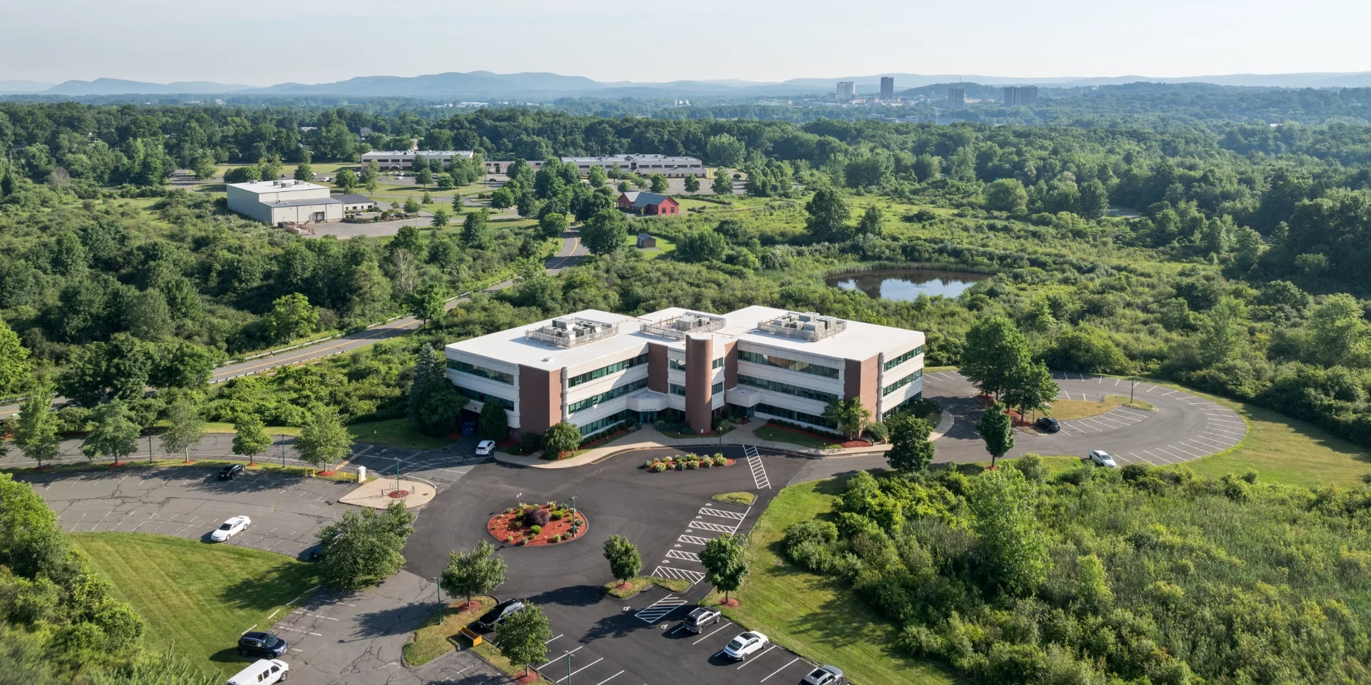 aerial of building exterior and property