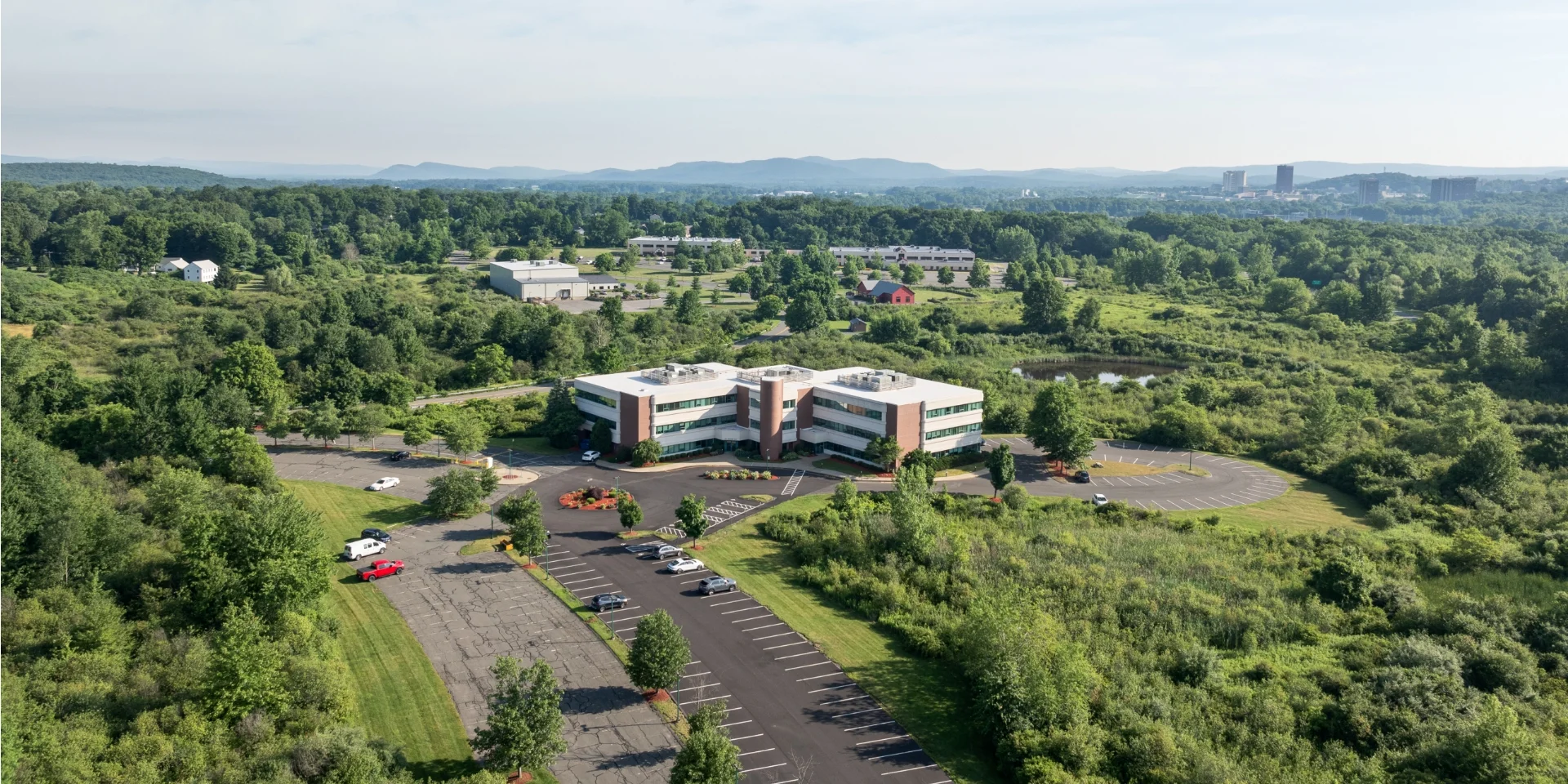 aerial of building exterior and property