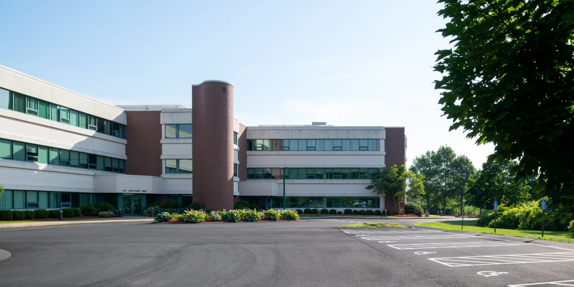 building exterior left side view and parking lot