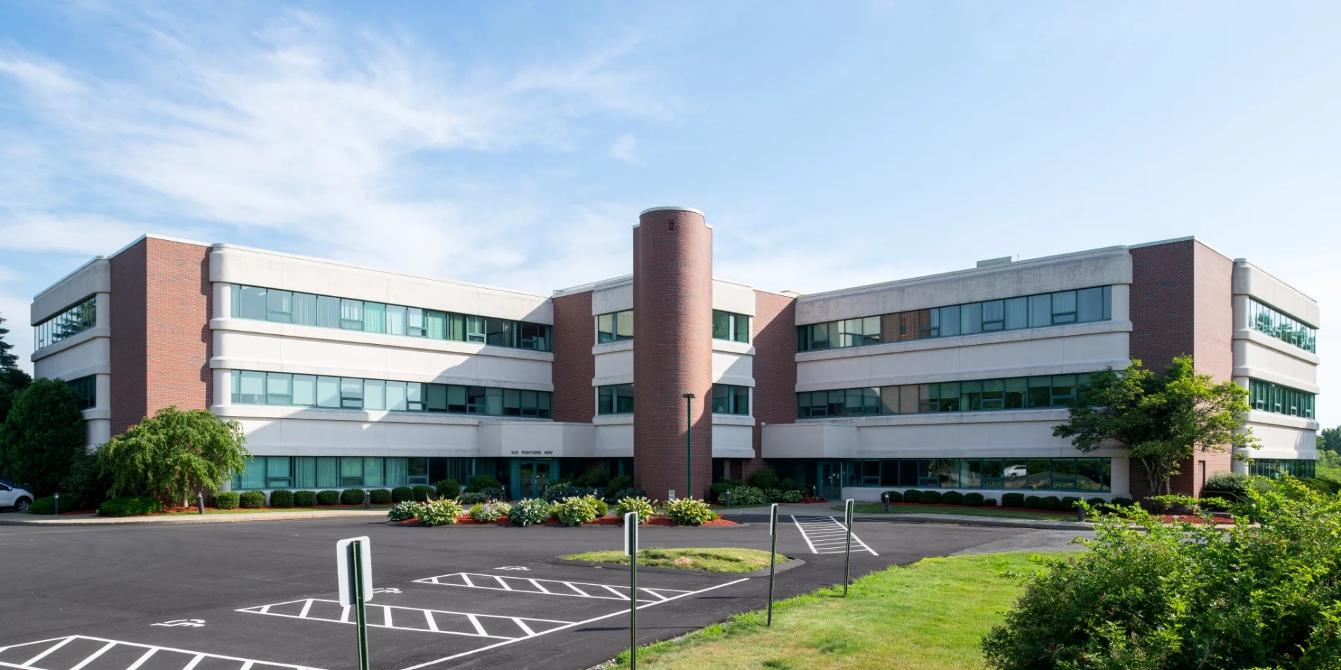 building front exterior and parking lot