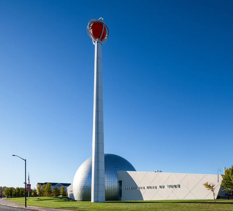 building exterior with basketball tower spire